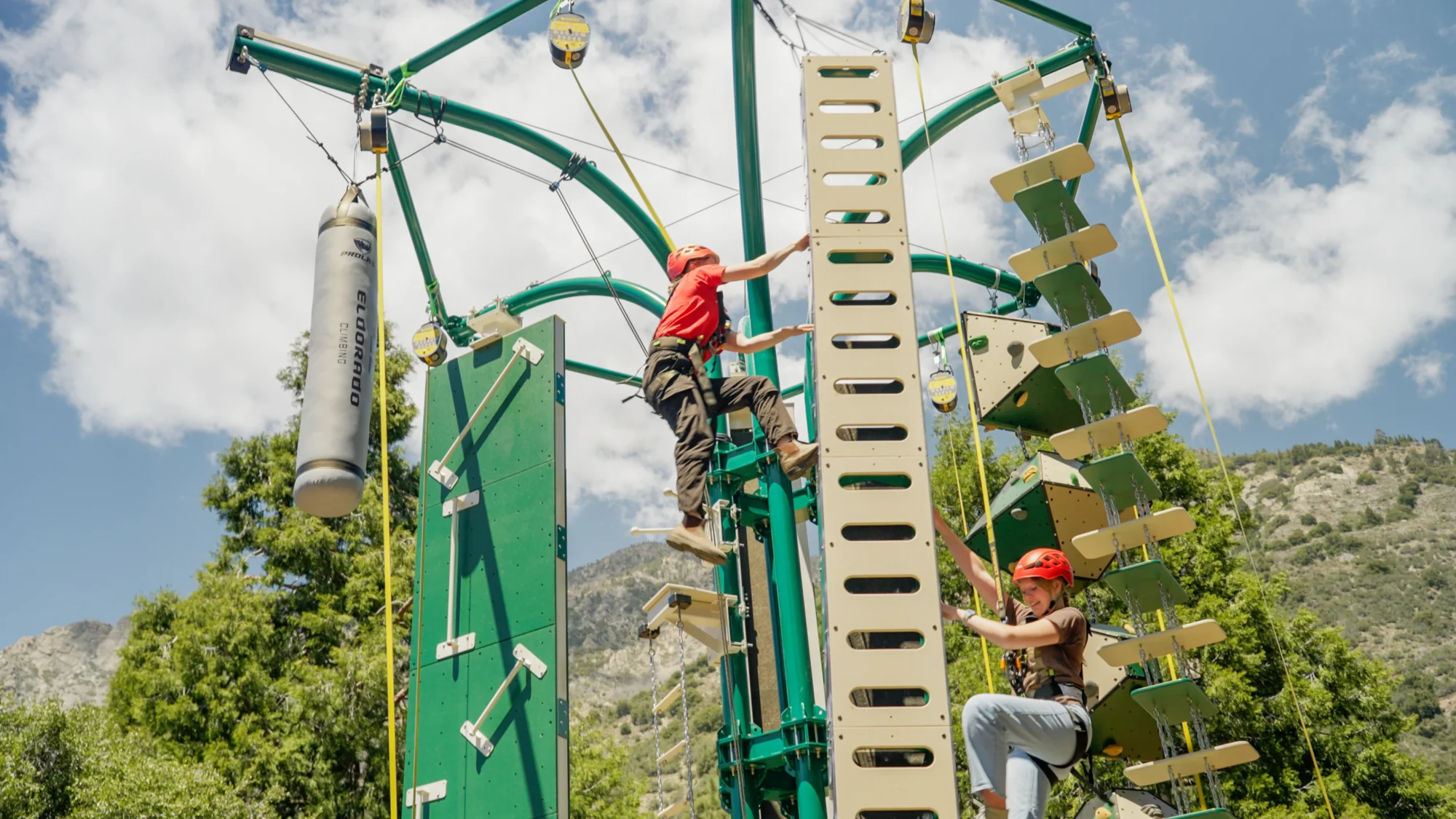 activities two climbers on adventure tower wide shot