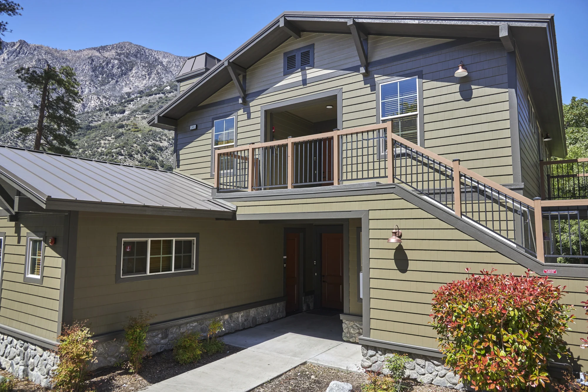 cedar ridge cabin exterior mountain backdrop