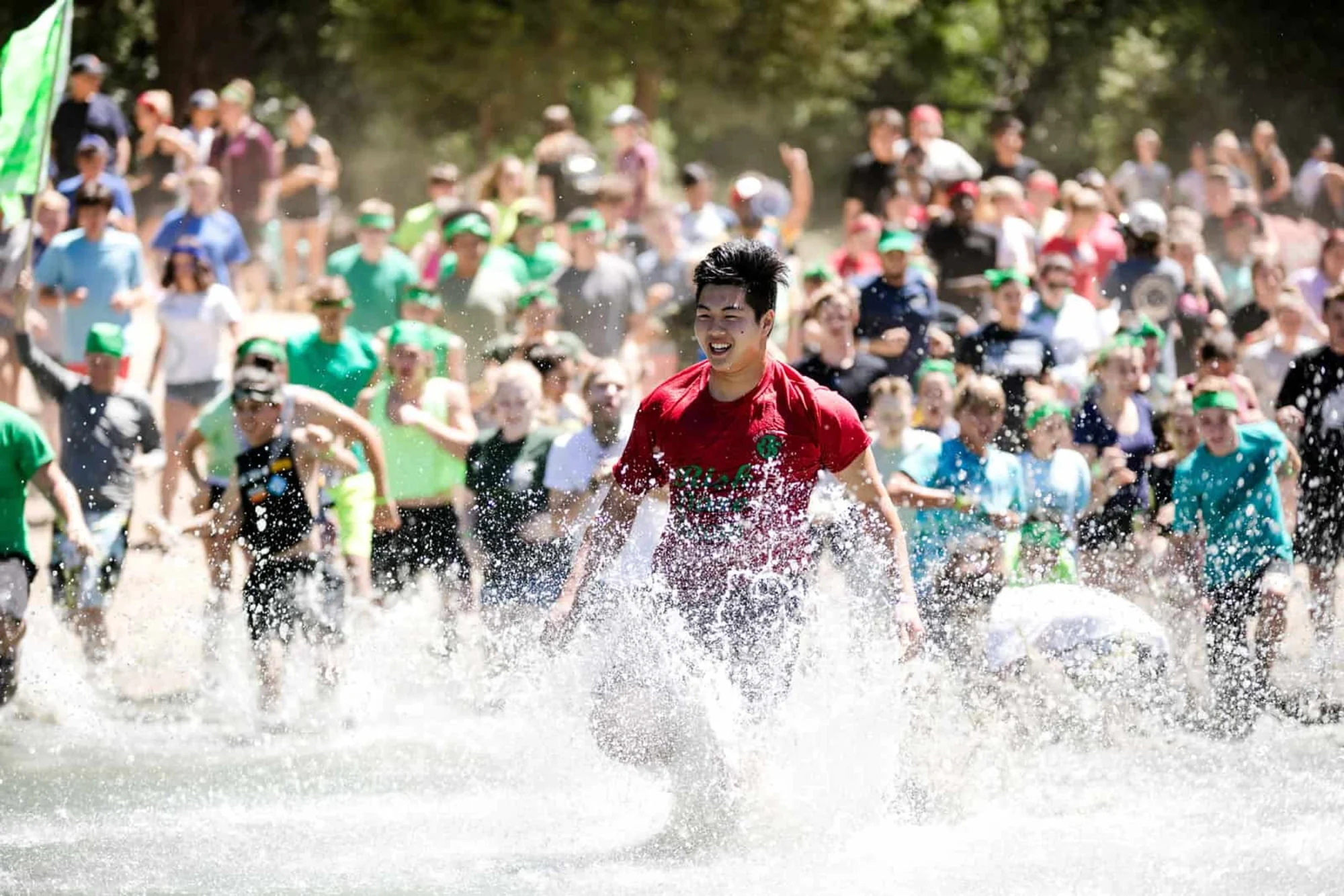 youth group running into water