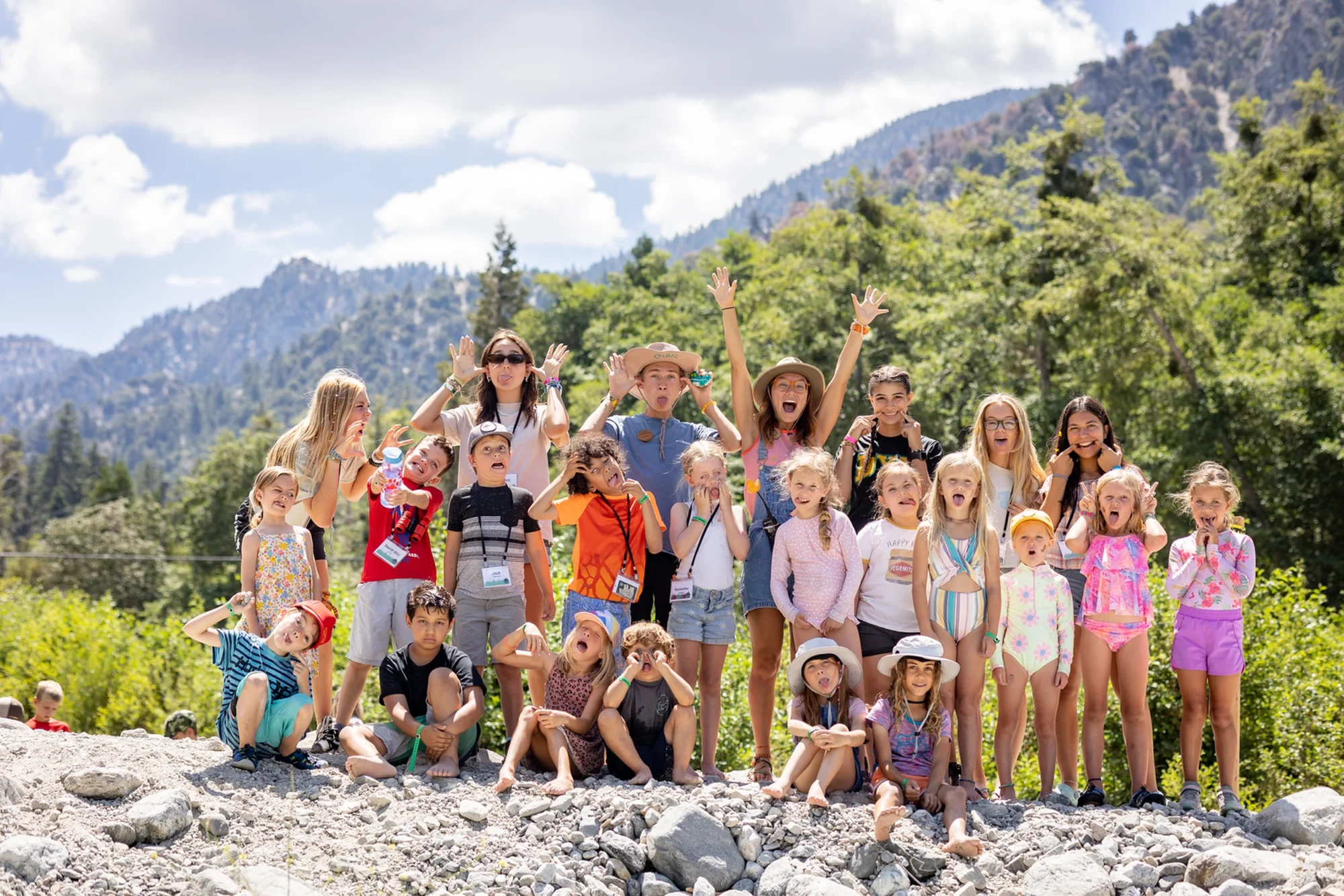 critter kids group creek trail hike excited pose
