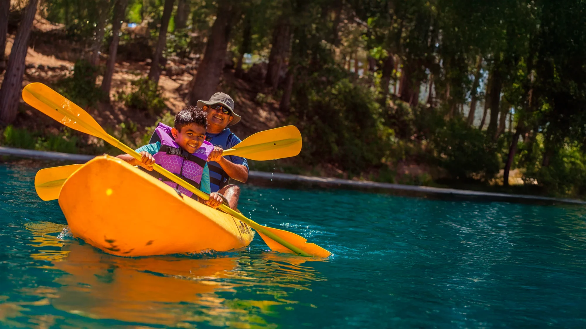 dad son family kayak