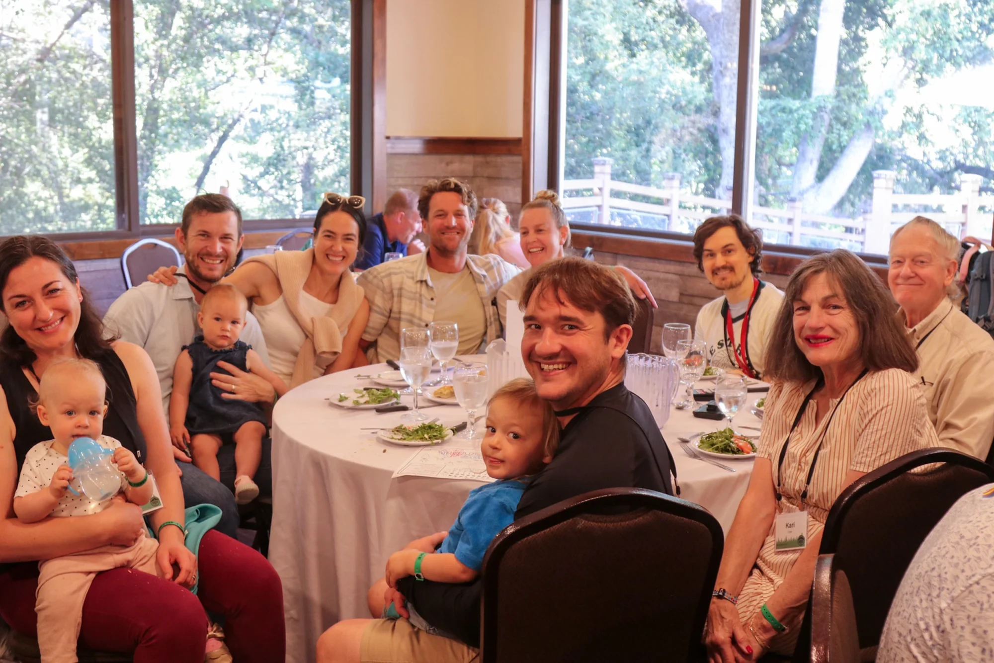 family camp adults dining multigenerational group photo