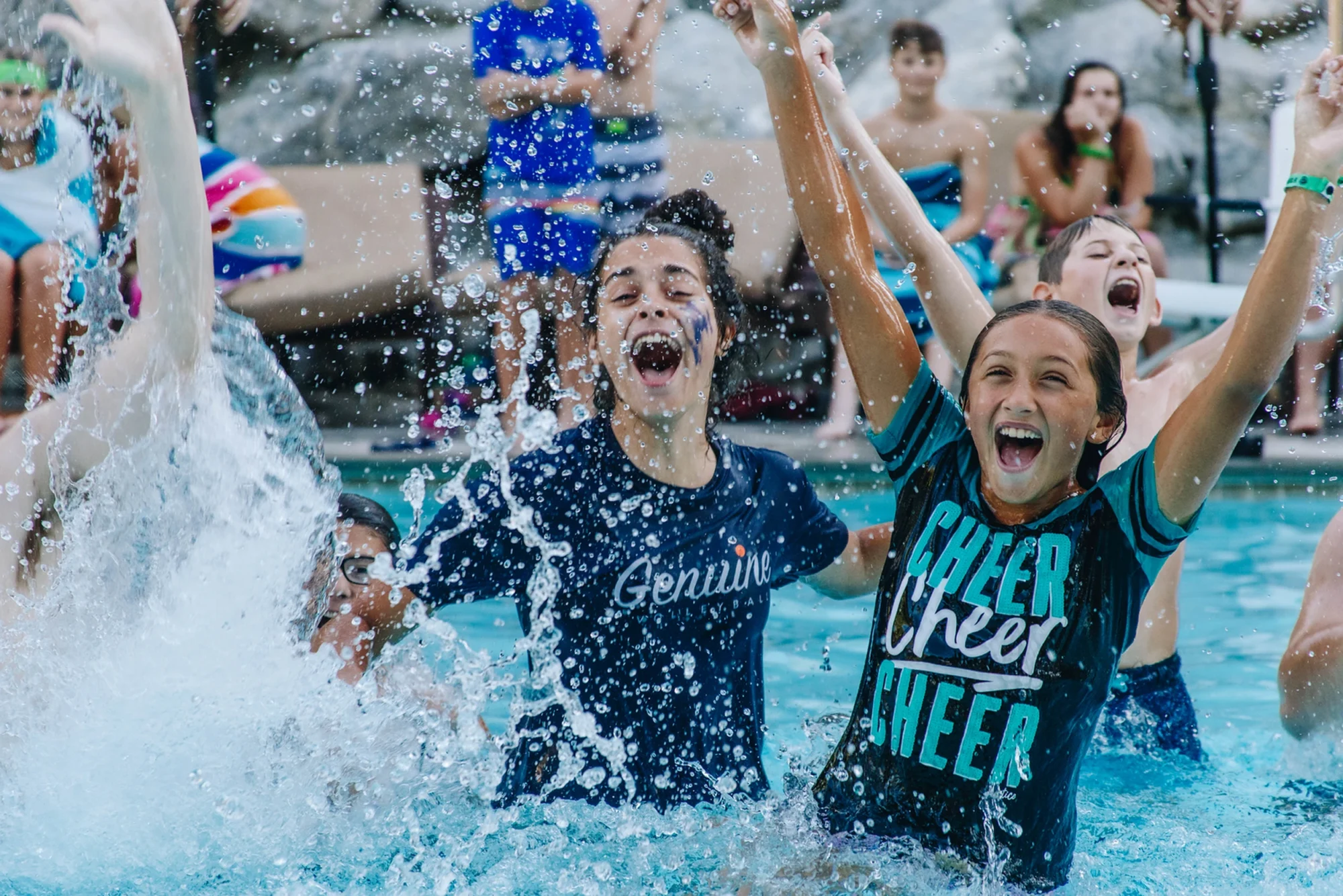 family camp basecamp teens screaming pool water splash fun