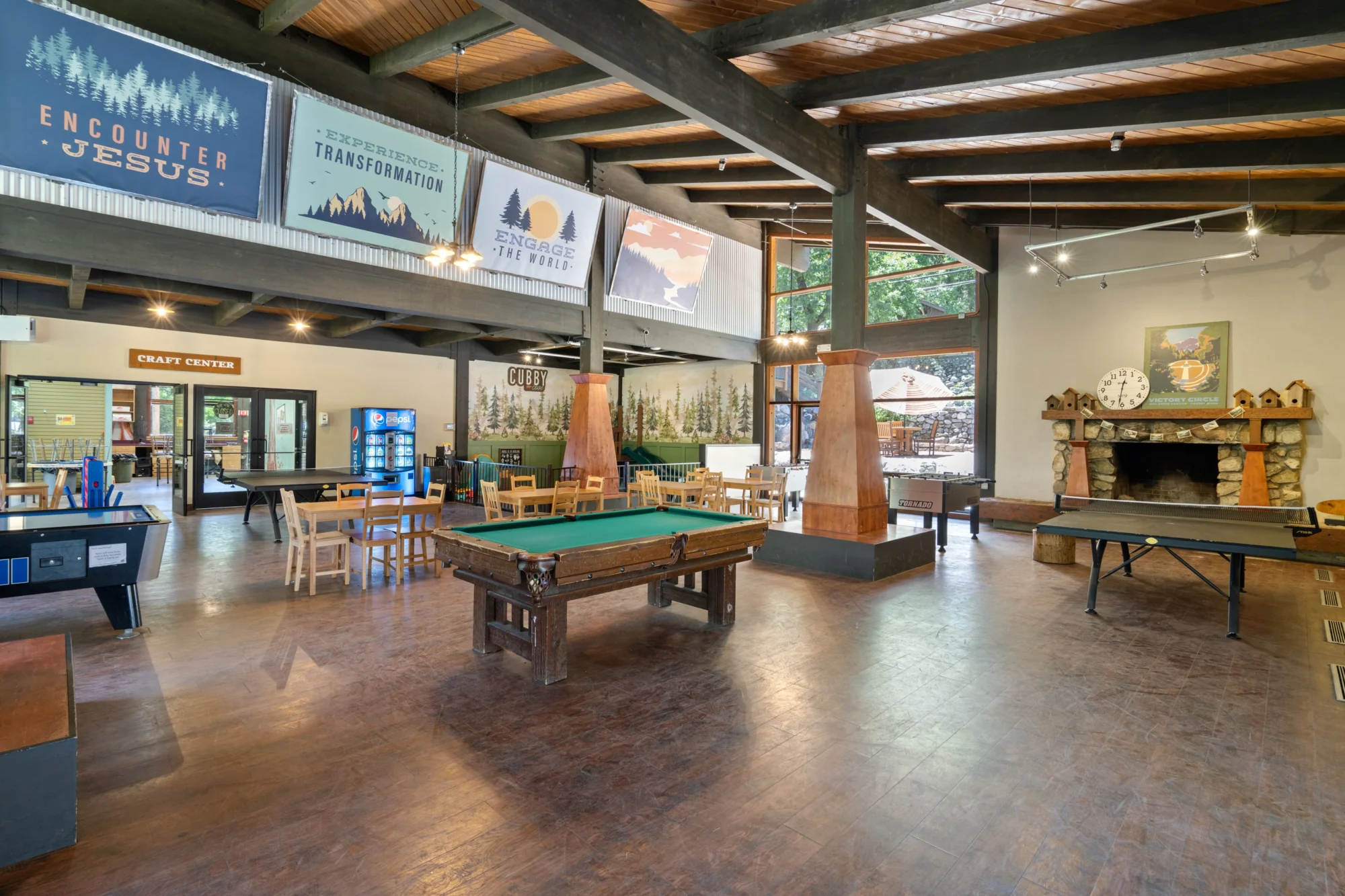 family camp game room den pool table fireplace interior
