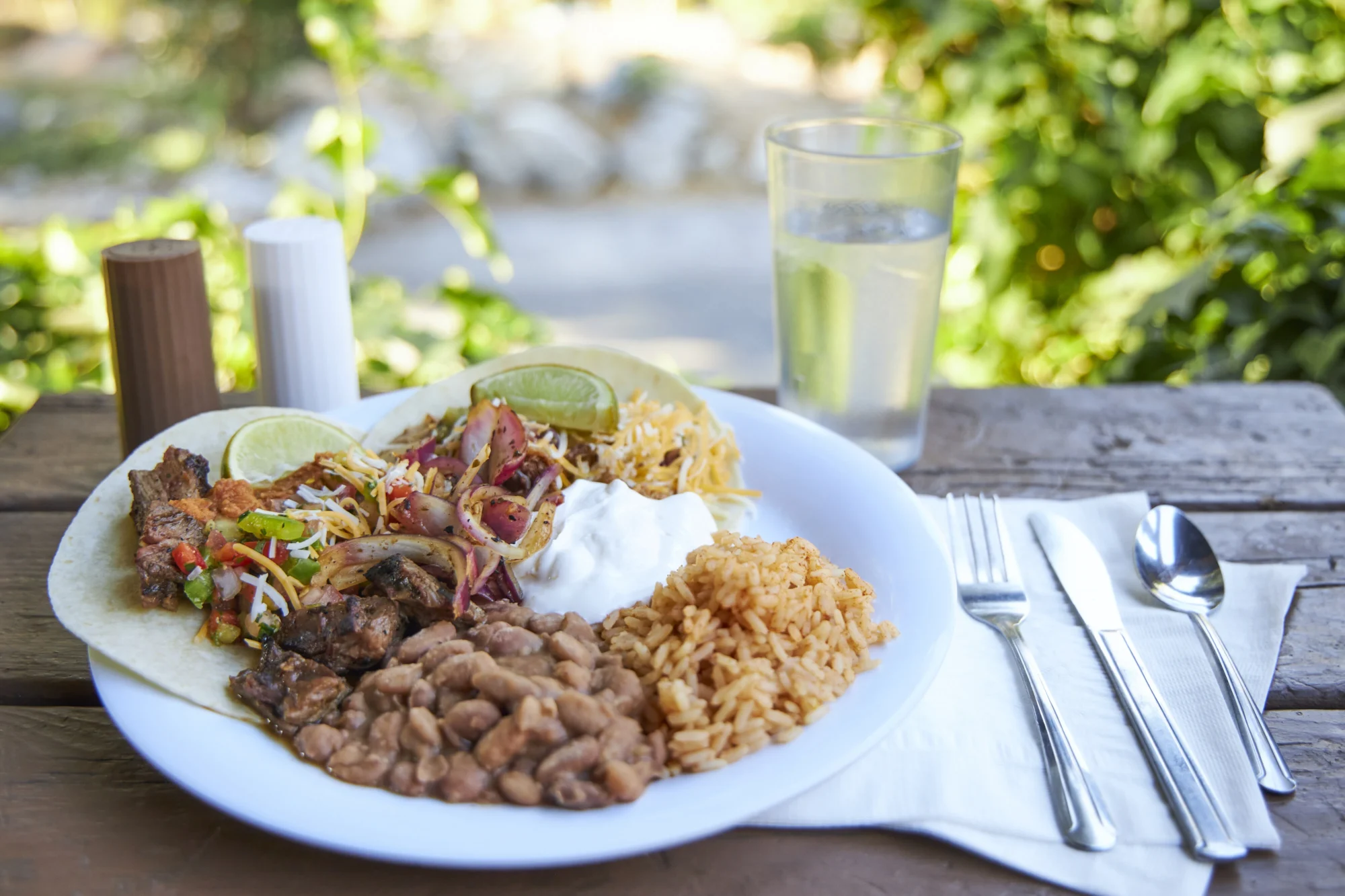 food dining mexican tacos rice beans plate outdoor camp table
