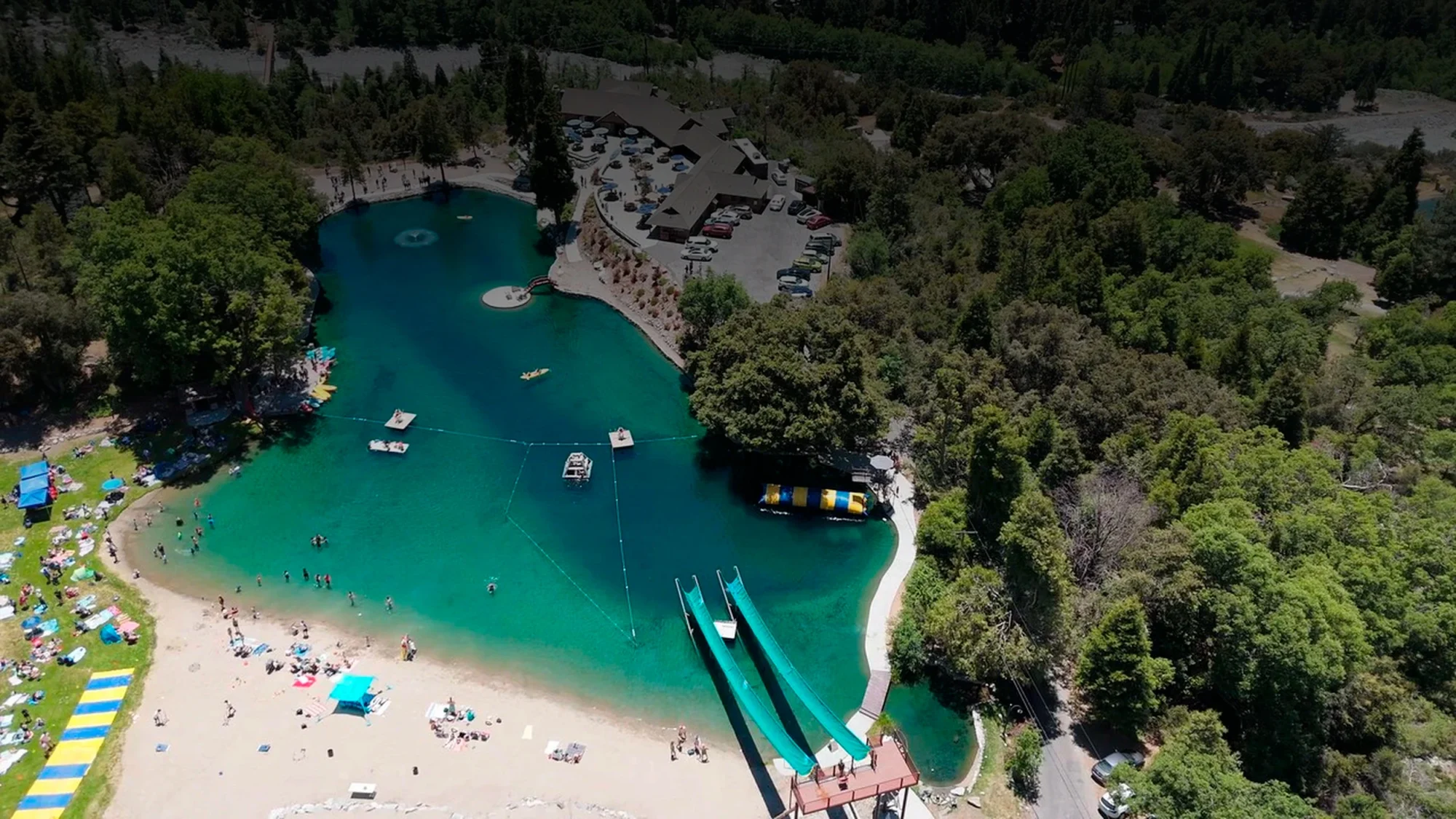 lakeview aerial drone lake water slides beach swimming recreation retouch